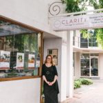 Clarity Wellness Managing Director Sarah Watson standing at front door